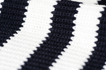Striped knitwear as a texture and background close up