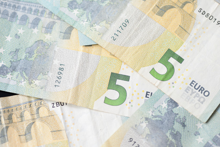 Five euro banknotes as a background close upの写真素材