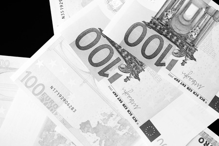 One Hundred euro banknotes as a background close up. Black and white