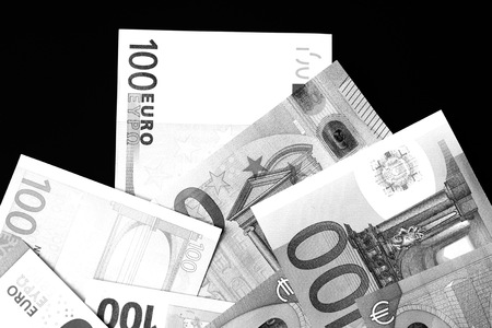 One Hundred and Fifty euro banknotes close up in black and white style