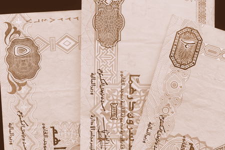 UAE dirham currency background close up. Brown color toned