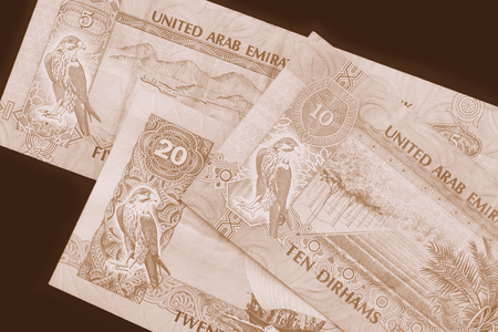 UAE dirham currency background close up. Brown color tonedの写真素材