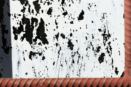 Old painted window behind iron bar close up. Grunge backgroundの写真素材