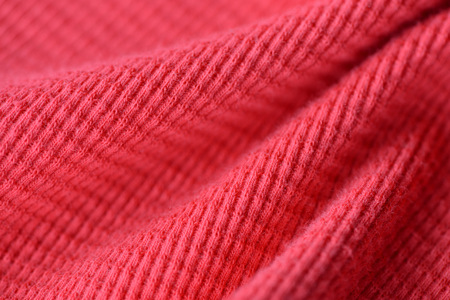 Textile texture coral color close up. Textile backgroundの写真素材
