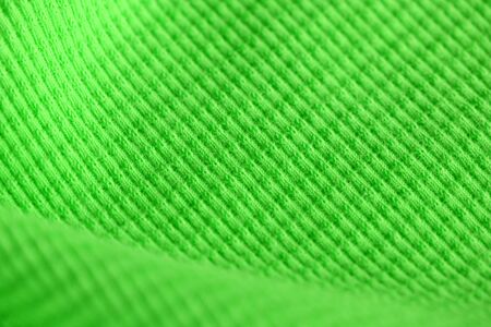 Textile surface of bright green color close-up. Abstract backgroundの写真素材