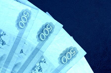 Banknote background from Russian rubles close up. Blue color tonedの写真素材