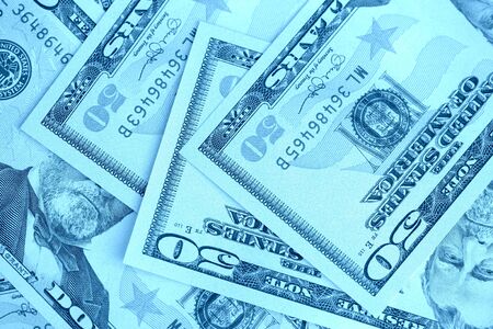 USD fifty dollar bills close up. Money background blue color tonedの写真素材