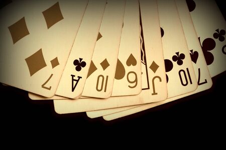Playing cards on a dark background close up. Retro styleの写真素材