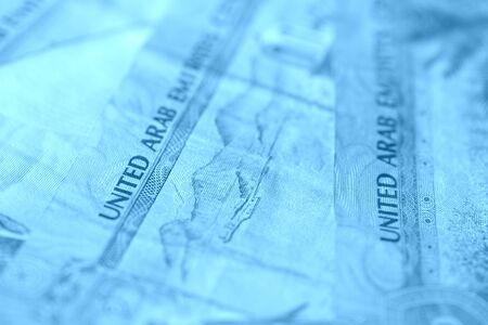 United Arab Emirates banknotes close up blue color toned