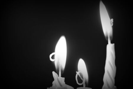 Birthday candles against a dark background close-up. Black and whiteの写真素材