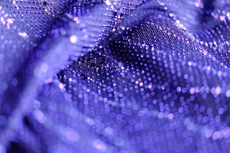 Blue fabric texture with sparkles close up. Textile backgroundの写真素材