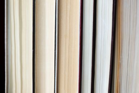 A stack of old books close-up. Educational background