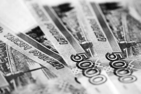 Russian banknotes of five thousand rubles close-up. Monochrome money backgroundの写真素材