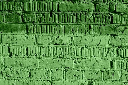 Painted brick wall close up. Abstract background green color tonedの写真素材