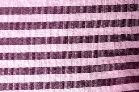 Striped textile background close-up. Pink color tonedの写真素材