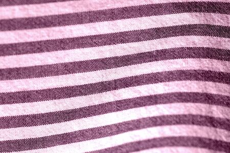 Striped textile background close-up. Pink color tonedの写真素材