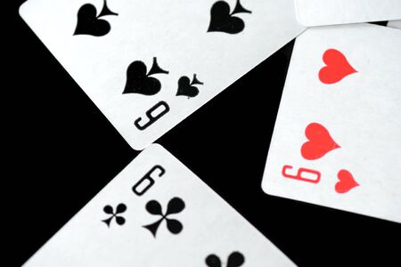 Playing cards on a black background close-up. Gambling Concept