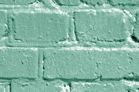 Painted brick wall close up. Abstract background green color tonedの写真素材