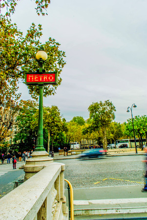 Metro station sign in a Beautiful street in Parisのeditorial素材