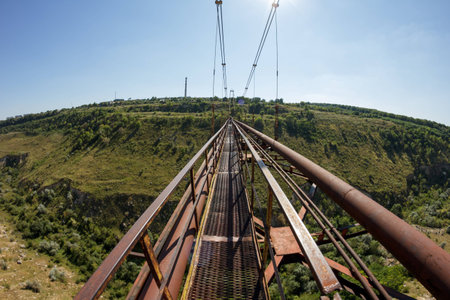 Old iron bridge across the ravine. Viaduct in Moldovaの写真素材