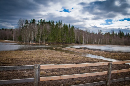 Wooden fence in the foregroundの写真素材