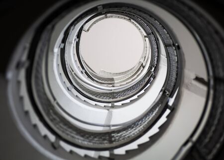 A modern twisted staircase in black and white