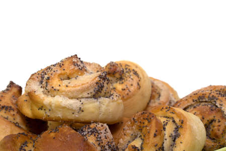 Freshly baked poppyseed buns isolated over white