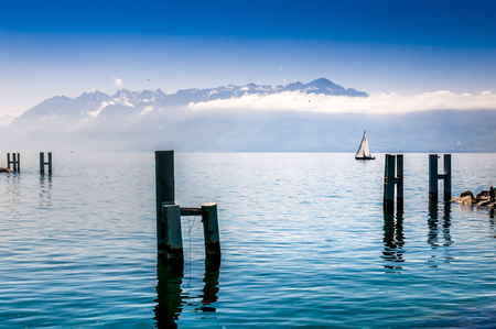 a sail boat on geneva lakeの写真素材