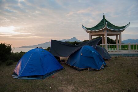 Campsite with shine of sunrise, Tai Po, Hong Kong, Chinaの写真素材