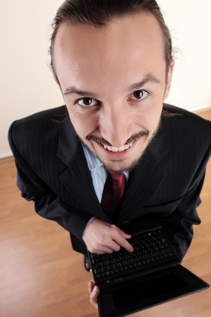 Young successful business man working at officeの写真素材