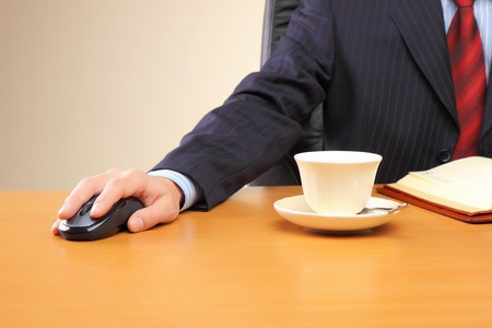 Businessman at office working at his workplace.の写真素材