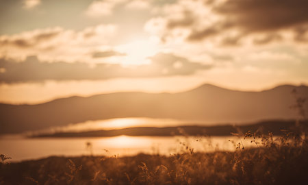 Sunset over the lake with mountains in the background - retro vintage effectの素材