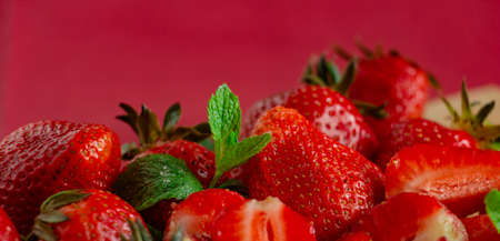 Appetizing juicy bright strawberries, sprinkled with powdered sugar - vitamin composition, the taste of summerの写真素材