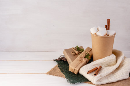 Christmas composition, cocoa with marshmallows on a white background, copy space