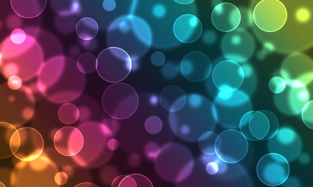 Festive holiday orange ping blue and yellow bokeh lightsの写真素材