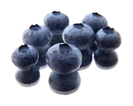 a few blueberries ona mirrorの写真素材