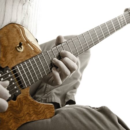 man playing electric guitar