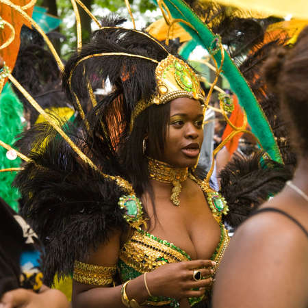 LUTON - MAY 31: Procession of colorful costumes of Luton Carnival 2010 parade; May 31; 2010 in Luton; UKのeditorial素材