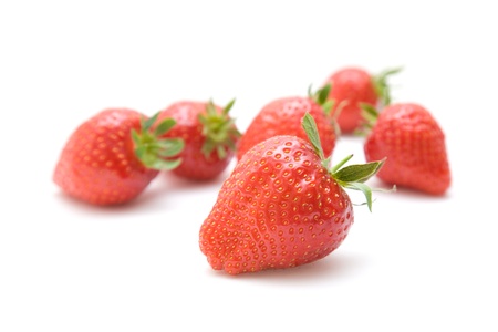 fresh red ripe strawberries isolated on white backgroundの写真素材