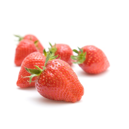 fresh red ripe strawberries isolated on white backgroundの写真素材