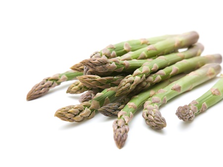fresh asparagus spears isolated on whiteの写真素材