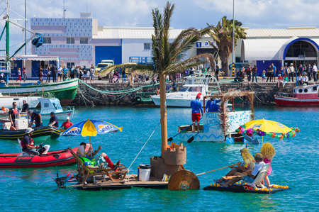 Participants take to water in a variety of unlikely crafts in the port for the yearly  Regata de...