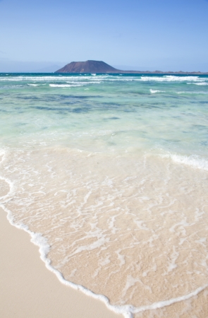 Northern Fuerteventura, Corralejo Flag Beach, Isla de Lobos and Lanzarote in the backgroundの写真素材