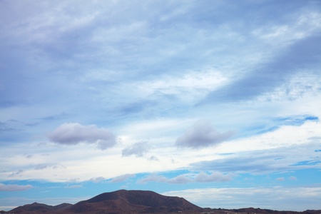 Fuerteventura, view towards extinct volcano Bayuyo, natural background of predominantly sky 