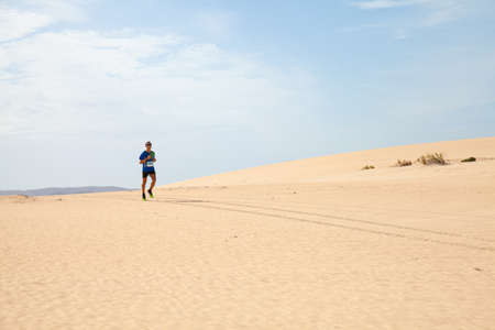 CORRALEJO - NOVEMBER 03: Men race leader and winner, Majid Belouati, at Fourth international Fuerteventura half-marathon 03 November, 2012 in Corralejo, Fuerteventura, Spainのeditorial素材