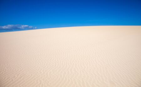 sand and wind pattern on  dunesの写真素材