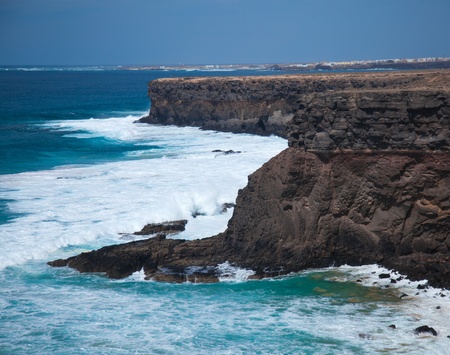 Eroded steep west coast of Fuerteventura, Playa del Aguilaの写真素材