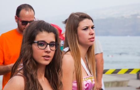 PUERTO DE LA CRUZ, SPAIN - February 16: participants prepare and assemble for the main carnival parade on February 16, 2013 in Puerto de la Cruz, Tenerife, Spainのeditorial素材