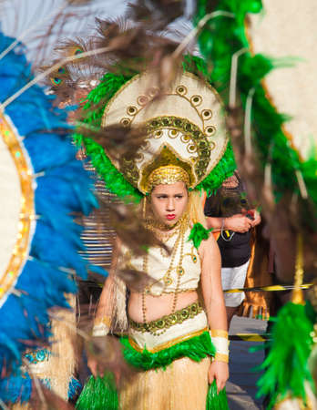 PUERTO DE LA CRUZ, SPAIN - February 16: Colorfully dressed participants take part in main carnival...