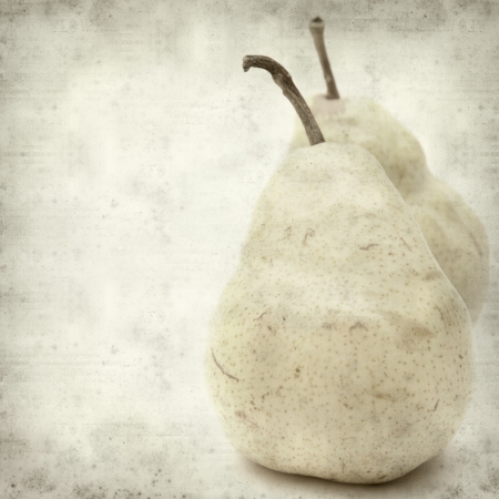 textured old paper background with yellow pearsの写真素材